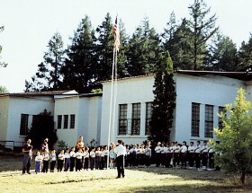 Raising the national flag at the Boys' school