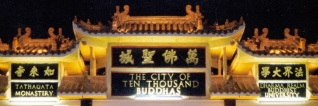 The words 'The City of Ten Thousand Buddhas' are engraved at the top center